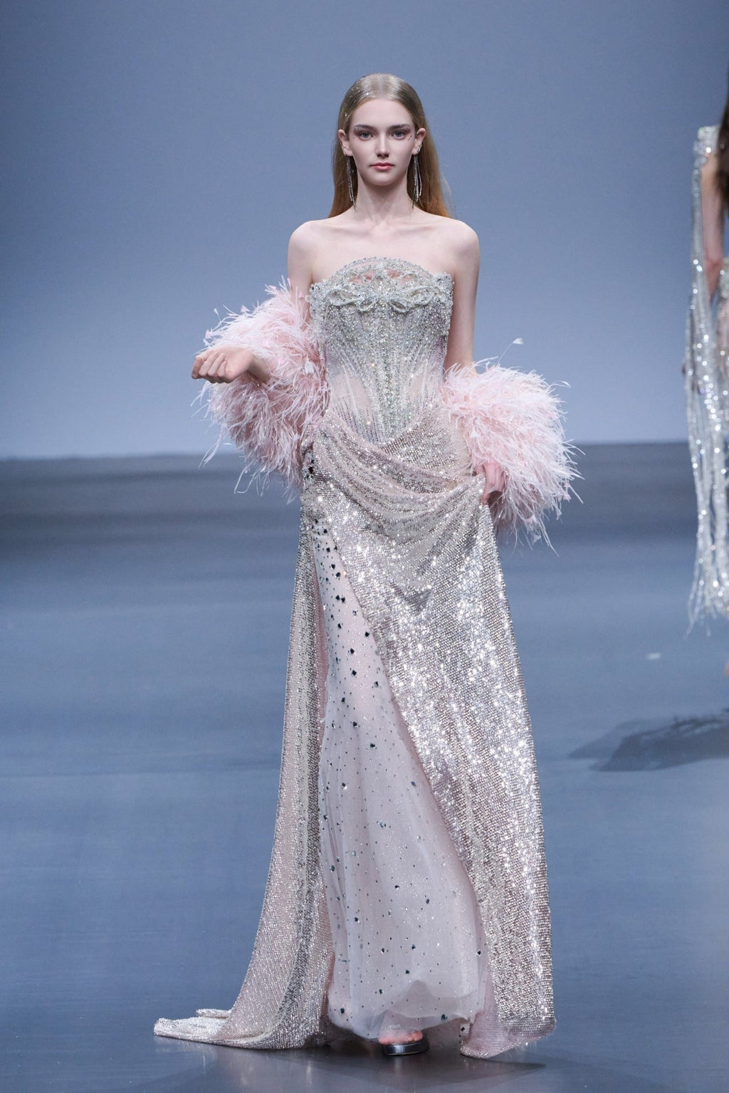 Shimmering silver beaded gown with structured bodice and feather boler – HERTROVE