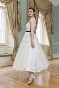 HerTrove-Midi Dress with Black Bow & Crystal Embellishments