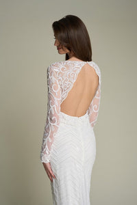 HerTrove-Hand-beaded gown with floral beaded sleeves and zig-zag motif skirt