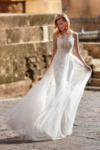 HerTrove-white gown with sheer overlay and exquisite detailing