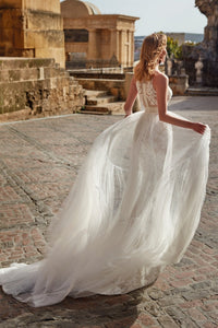HerTrove-white gown with sheer overlay and exquisite detailing