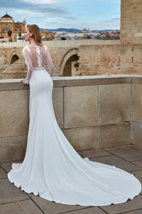 HerTrove-white gown with plunging neckline and thigh-high slit