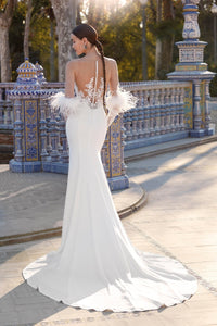HerTrove-Elegant white gown with plunging neckline and feather details