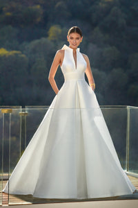 HerTrove-white ball gown with plunging neckline and pleated skirt