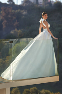 HerTrove-white ball gown with plunging neckline and pleated skirt