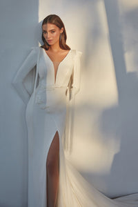 HerTrove-Column white gown with plunging neckline and dramatic train