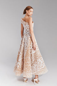 HerTrove-Threads of white contrasted on a nude midi dress