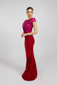 HerTrove-An evening dress made of crepe and taffeta .