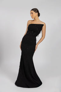 HerTrove-A long black crepe dress with a diagonal neckline and crystals.