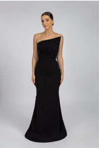 HerTrove-A long black crepe dress with a diagonal neckline and crystals.