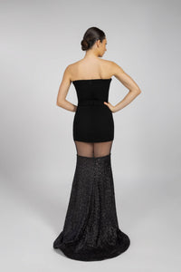 HerTrove-An evening dress made of crepe, tulle, and sequins, with crystals of the same color.