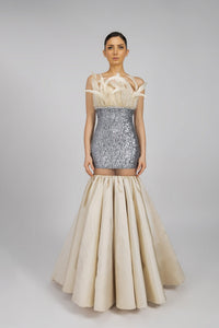 HerTrove-An evening dress made of shiny sequins and crepe, adorned with feathers and crystals.