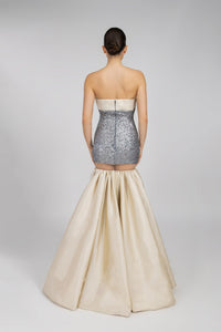 HerTrove-An evening dress made of shiny sequins and crepe, adorned with feathers and crystals.