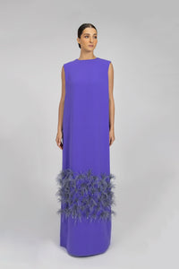 HerTrove-A long crepe dress with a straight cut, featuring feather and hand-embroidered crystal embellishments at the bottom.