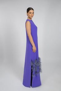 HerTrove-A long crepe dress with a straight cut, featuring feather and hand-embroidered crystal embellishments at the bottom.