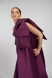 HerTrove-A long modern dress made of taffeta, with a wide and flowing silhouette.