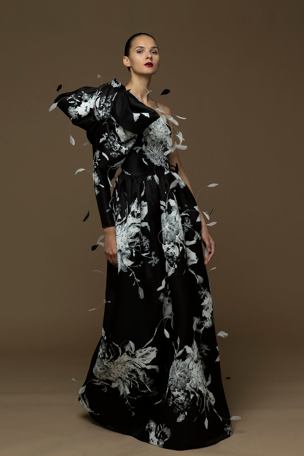 Floral printed feathered one sleeve gown- Hertrove