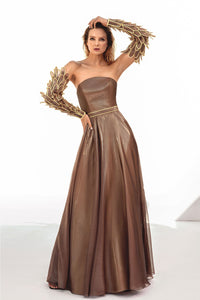 Corseted chiffon dress with armor sleeves in hand-crafted plumes - HerTrove