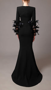 Feathered sleeves deep V neckline mermaid dress Jean-Louis Sabaji