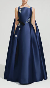Cape style gown with crystal embellishments | HerTrove
