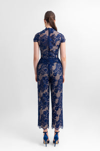 High-neckline lace top with flower details on the side, paired with straight-cut ankle-length pants - HerTrove