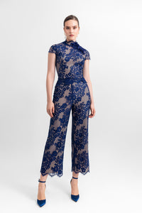 High-neckline lace top with flower details on the side, paired with straight-cut ankle-length pants - HerTrove