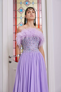 Built in corseted dress featuring Swarovski crystals and feather details - HerTrove