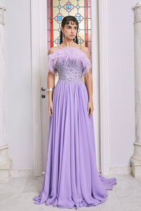Built in corseted dress featuring Swarovski crystals and feather details - HerTrove