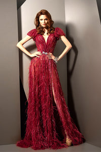 Her Trove - Feather detailed beaded gown